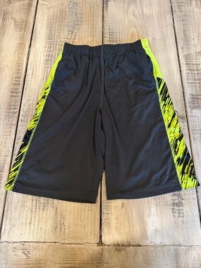 Nike Men's Black Athletic Shorts with Neon Yellow Side Panels